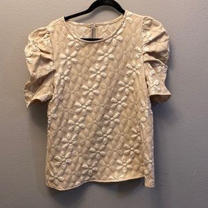 Tan loose fitting floral shirt